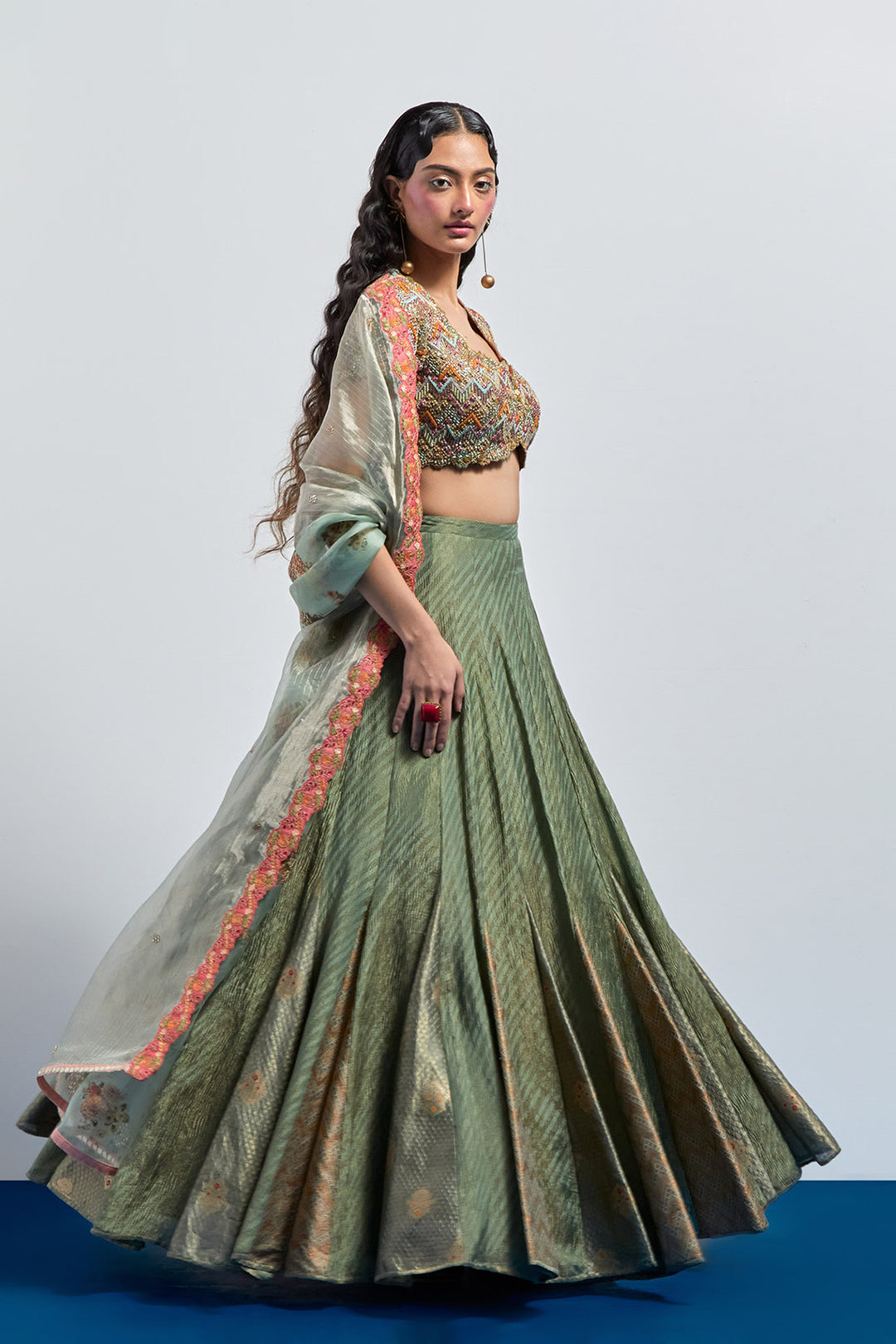 saga green embroidered lehenga choli dupatta set
