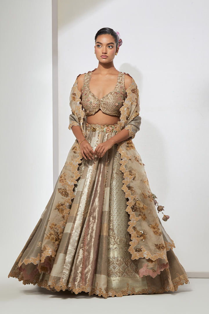 Ivory Taupe Silver Multi-Panel Tissue and Silk Brocade Lehenga Set with 3D Tassel Corset Blouse