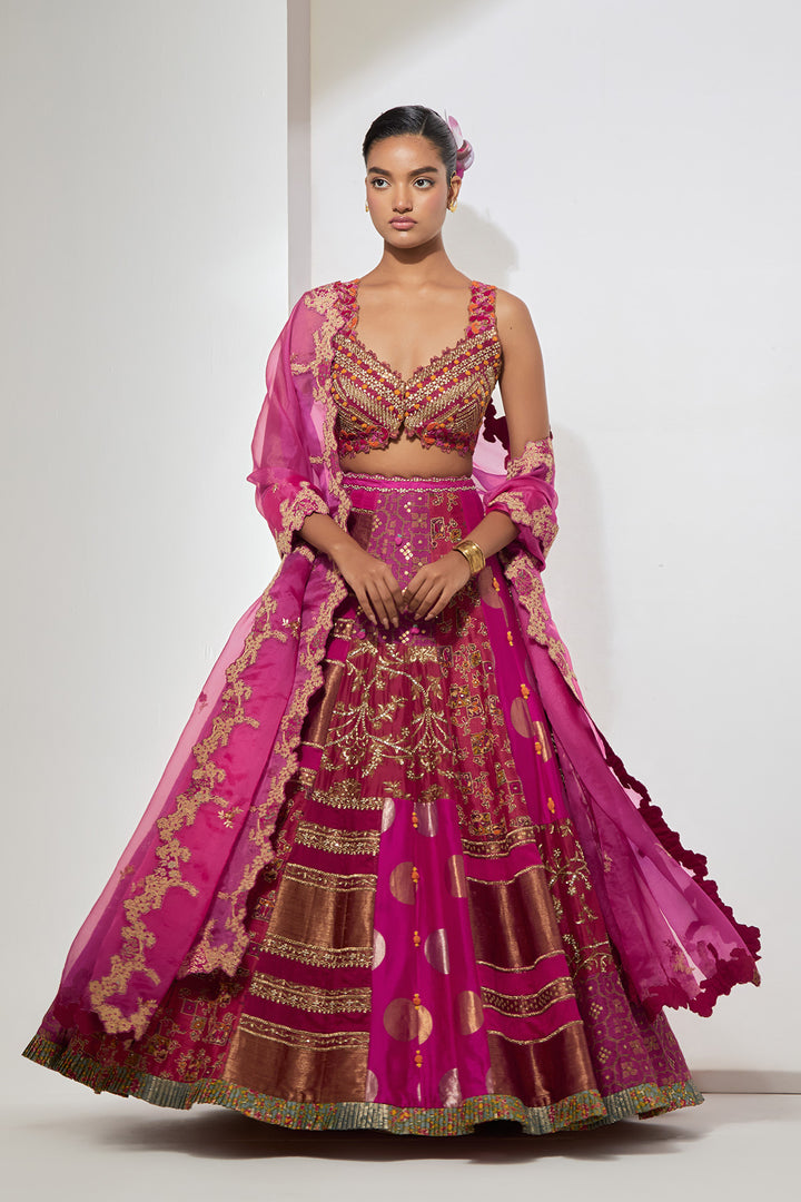 Fuchsia &amp; Rust Orange Multi-Panel Patchwork Lehenga Set with Heavy Pom-Pom Corset Blouse