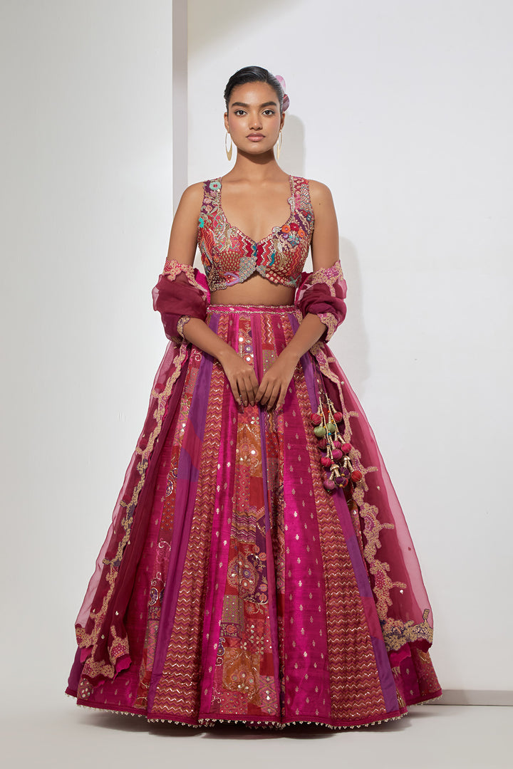 Fuchsia Pink Patchwork Banarasi Silk Lehenga Set with Heavy Multicolor Embroidered Blouse