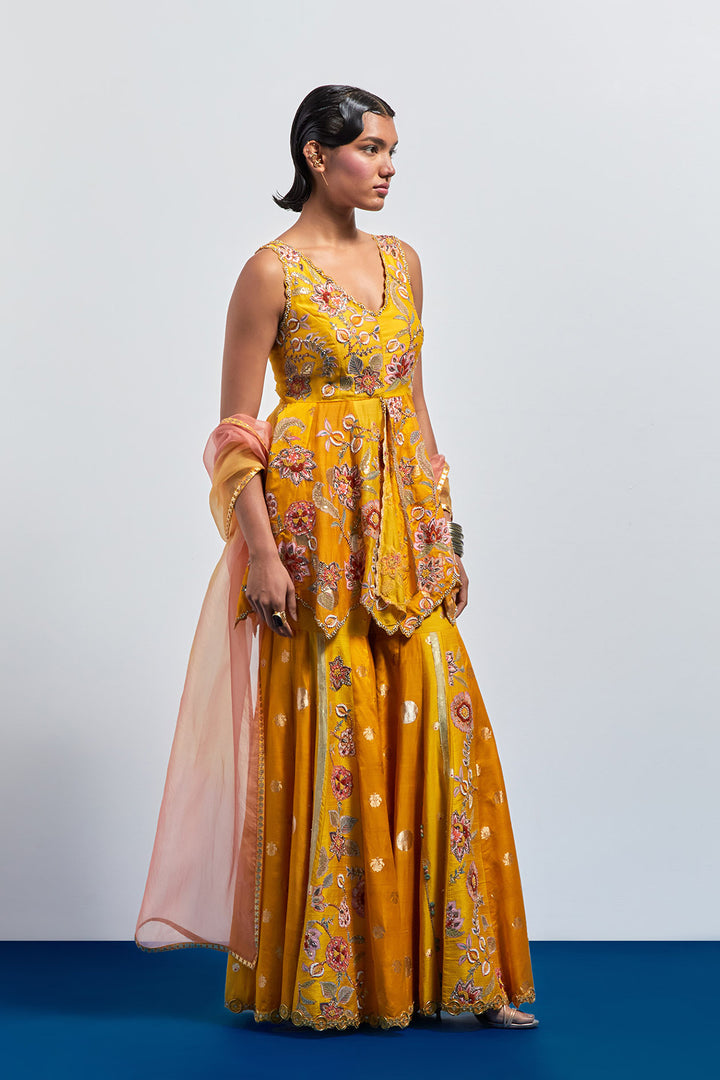 Mustard yellow embroidered peplum sharara set
