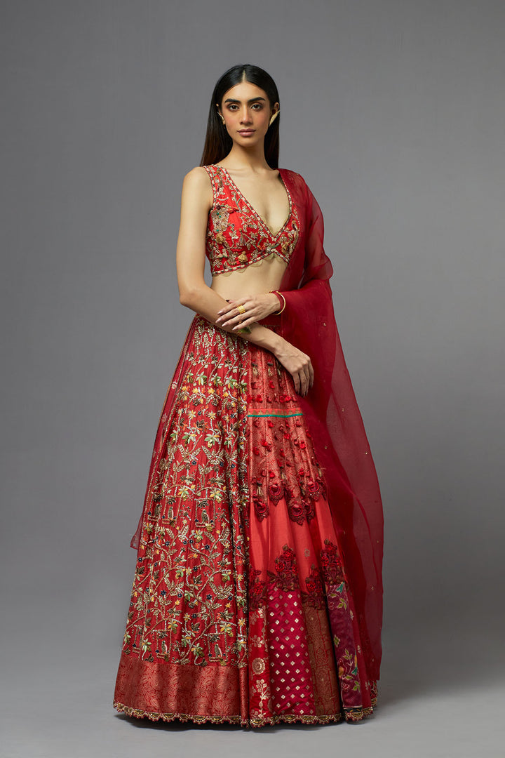 Red embroidered lehenga choli with dupatta