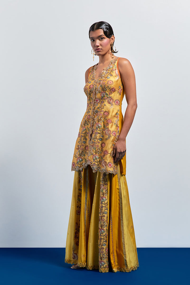 Mustard yellow embroidered peplum sharara set