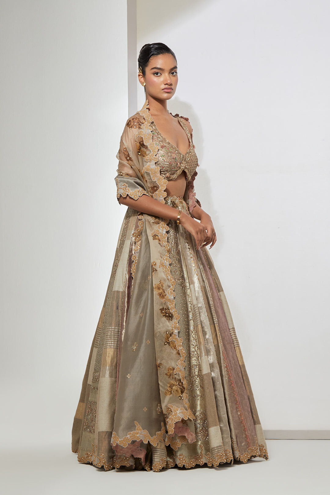 Ivory Taupe Silver Multi-Panel Tissue and Silk Brocade Lehenga Set with 3D Tassel Corset Blouse