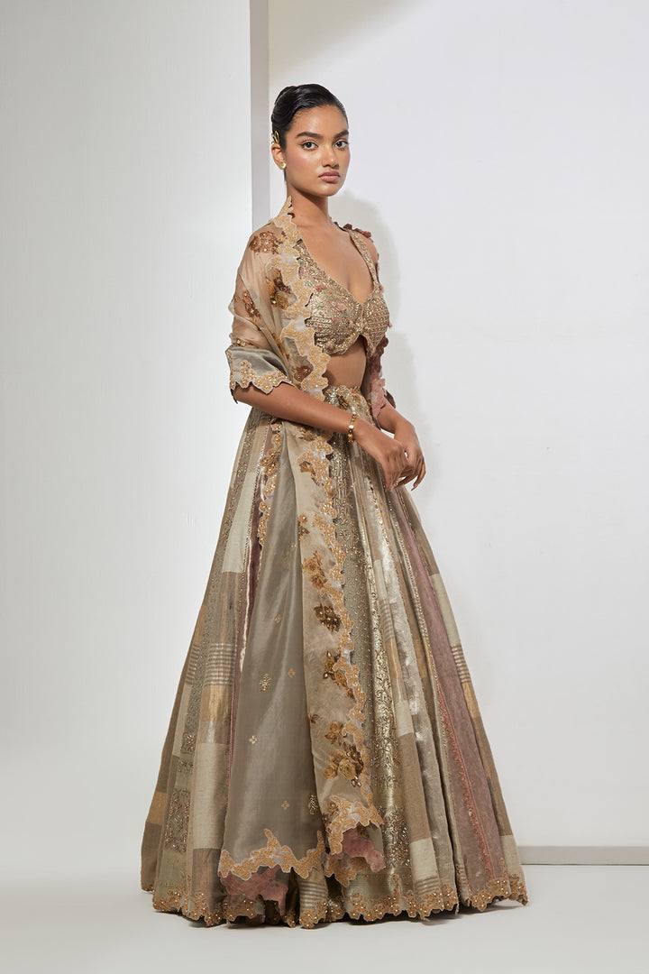 Ivory Taupe Silver Multi-Panel Tissue and Silk Brocade Lehenga Set with 3D Tassel Corset Blouse