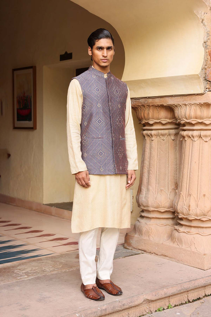 Beige kurta set with embroidered nehru jacket