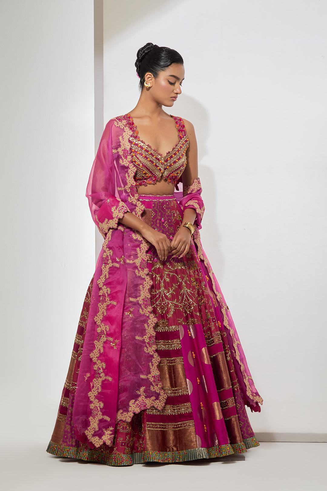 Fuchsia &amp; Rust Orange Multi-Panel Patchwork Lehenga Set with Heavy Pom-Pom Corset Blouse