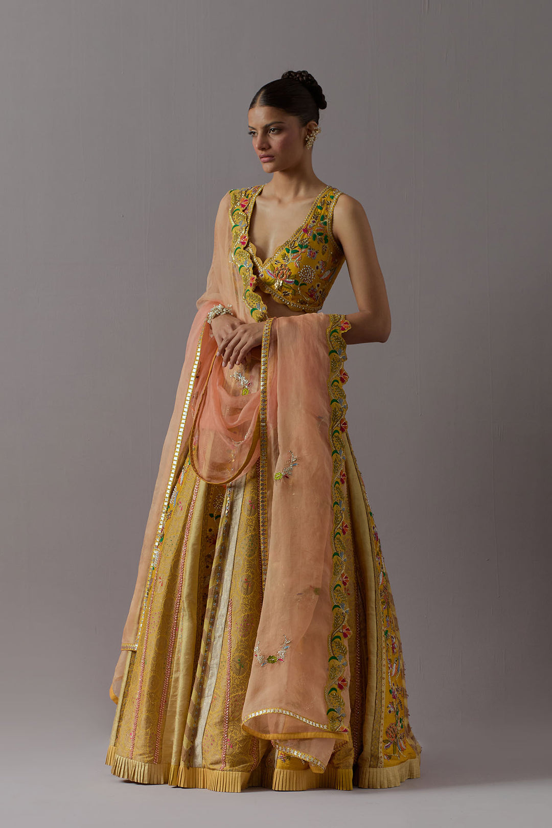 Mustard yellow embroidered lehenga choli with dupatta