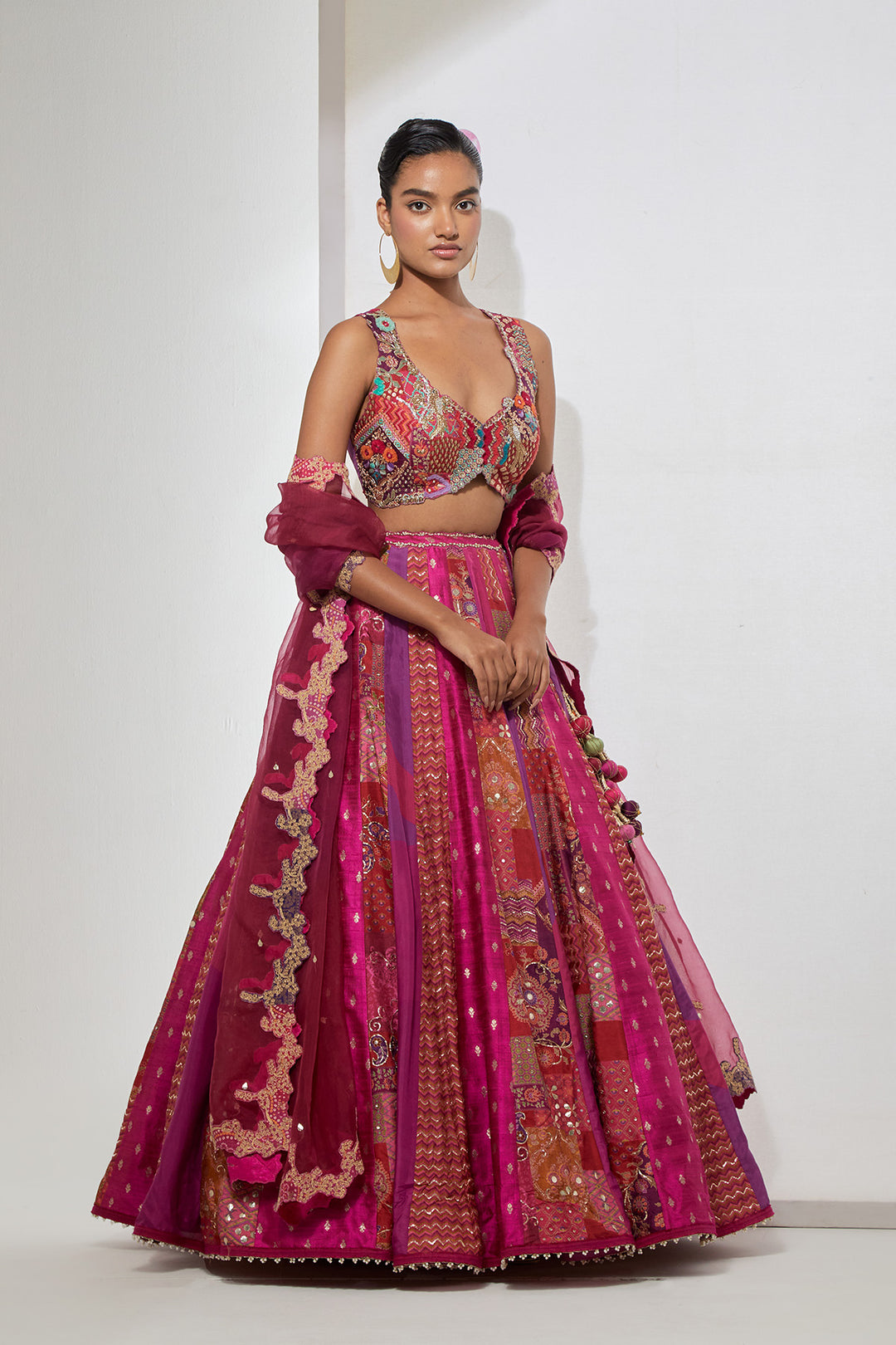 Fuchsia Pink Patchwork Banarasi Silk Lehenga Set with Heavy Multicolor Embroidered Blouse