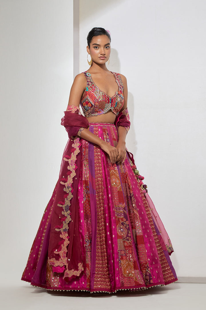 Fuchsia Pink Patchwork Banarasi Silk Lehenga Set with Heavy Multicolor Embroidered Blouse
