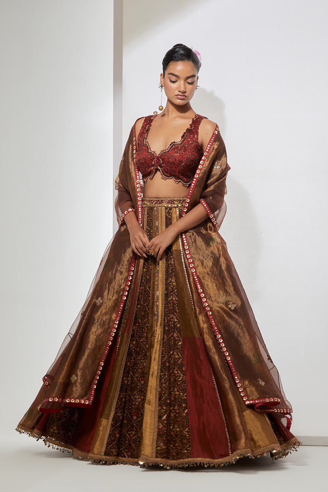 Rust Red &amp; Antique Gold Striped Panel Lehenga Set with Heavy Scalloped Corset Blouse
