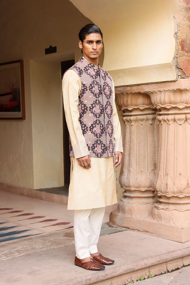Cream kurta set with statement jacket