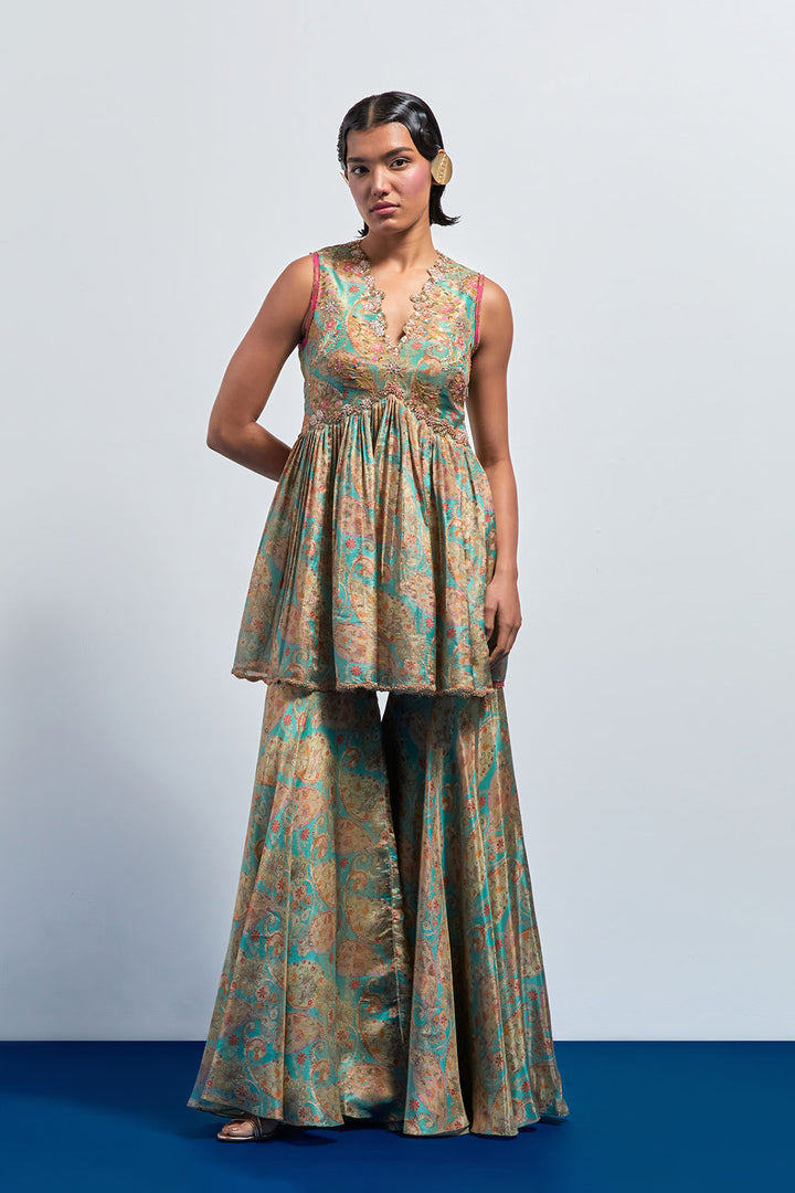 Saga green embroidered peplum sharara set