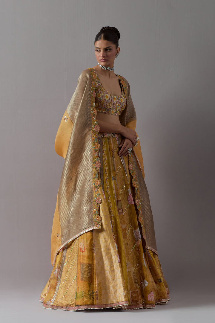 Golden mustard embroidered lehenga choli with dupatta