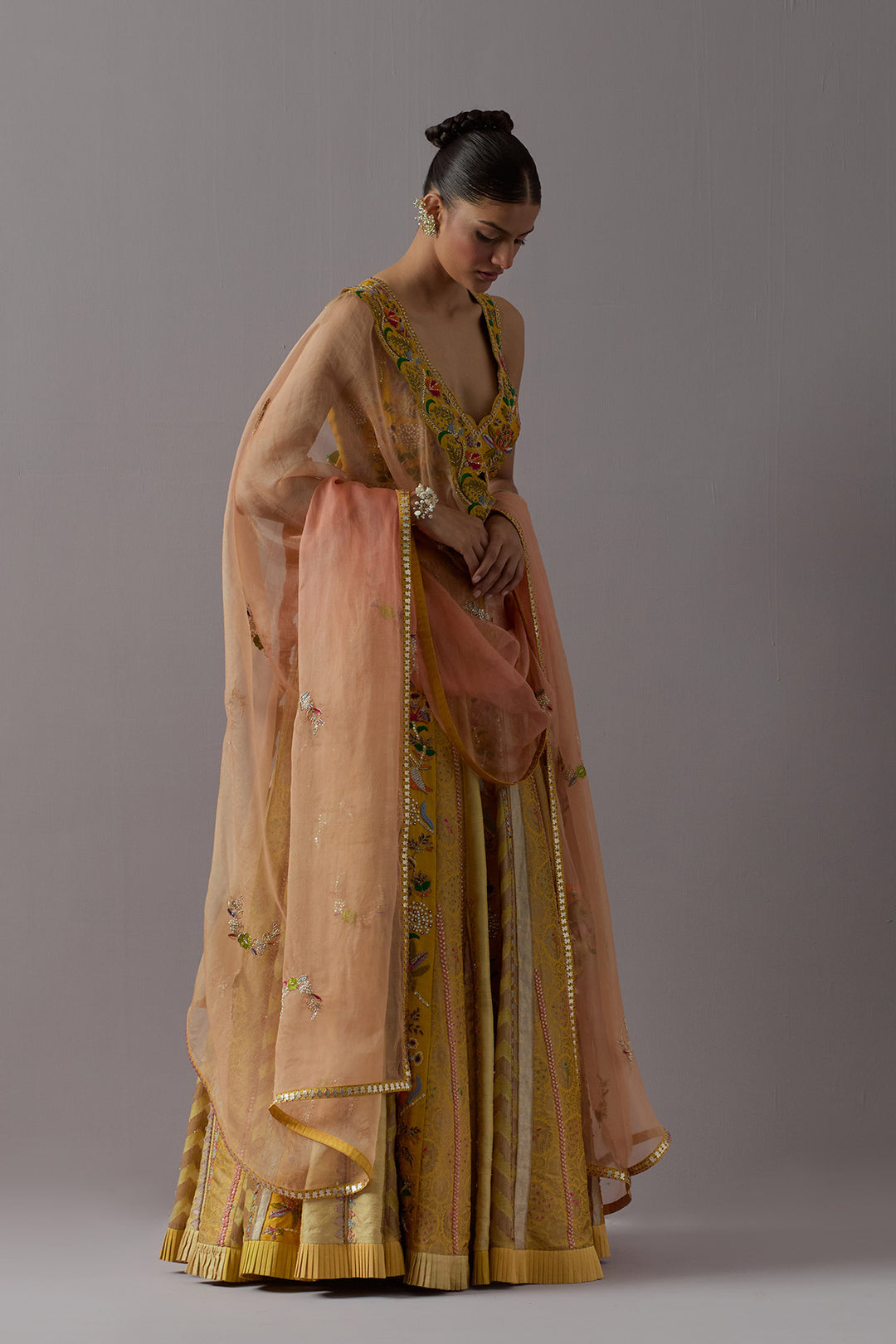 Mustard yellow embroidered lehenga choli with dupatta