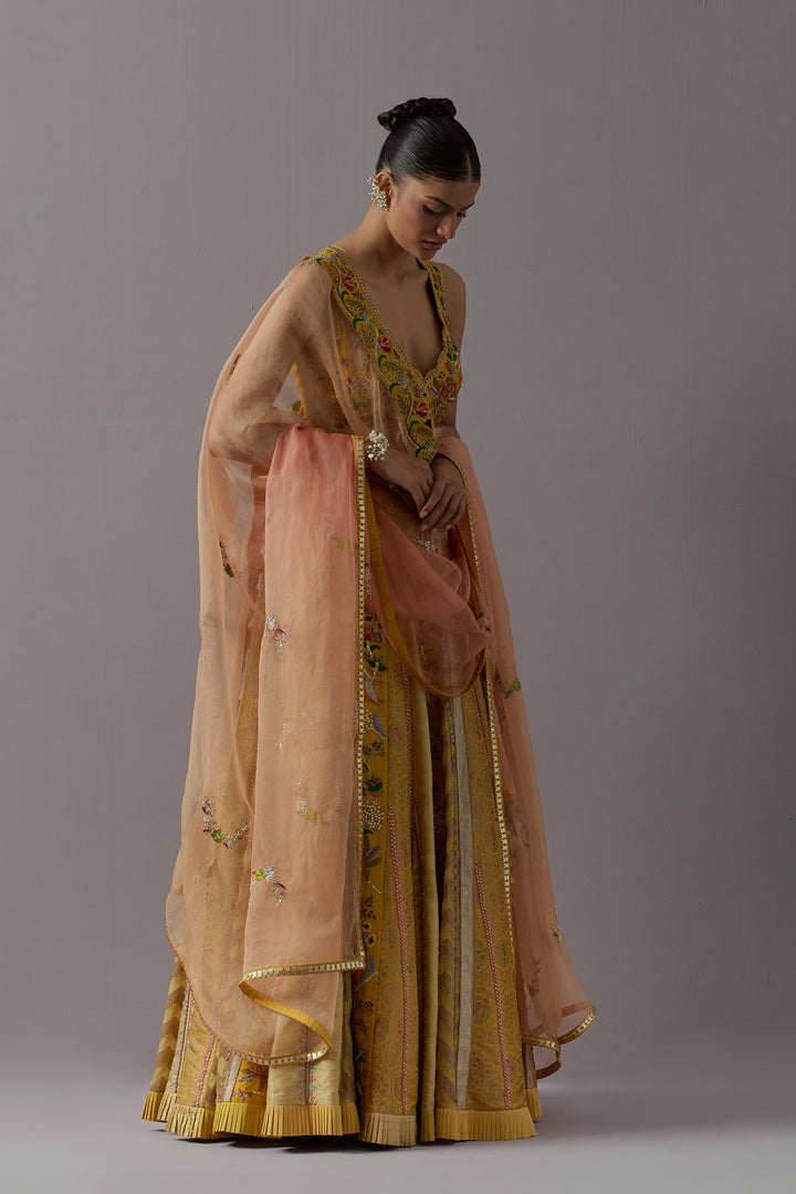 Mustard yellow embroidered lehenga choli with dupatta