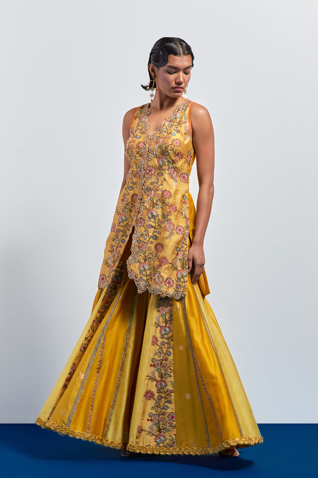 Mustard yellow embroidered peplum sharara set