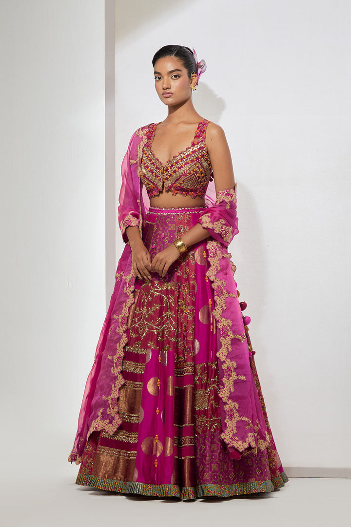 Fuchsia &amp; Rust Orange Multi-Panel Patchwork Lehenga Set with Heavy Pom-Pom Corset Blouse