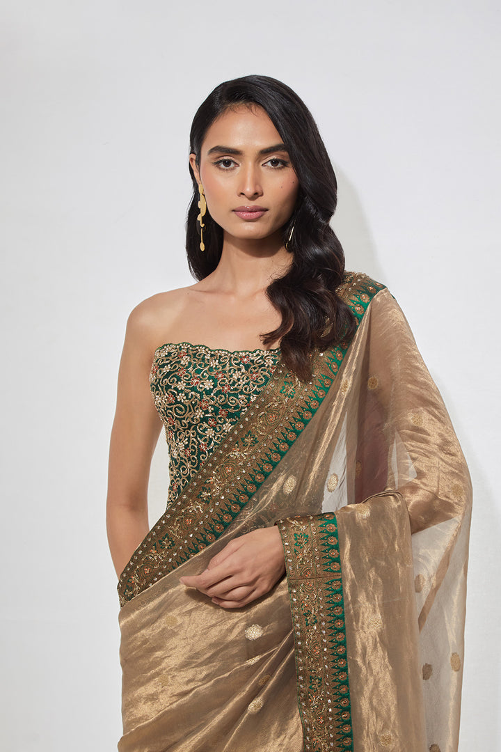 Antique Gold Tissue Saree with Emerald Green Border &amp; Heavy Corset Blouse
