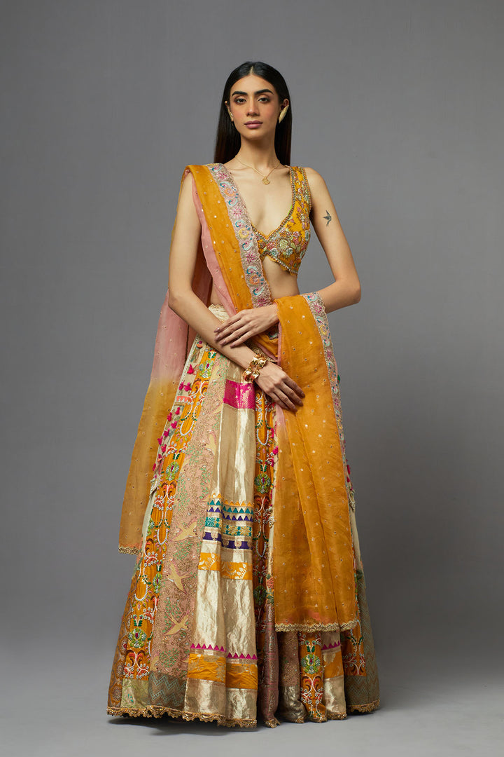 Mustard yellow embroidered lehenga choli with dupatta