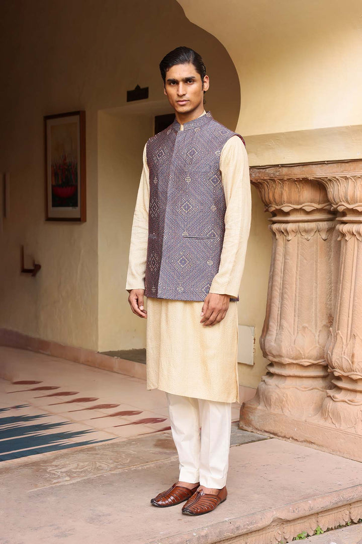 Beige kurta set with embroidered nehru jacket