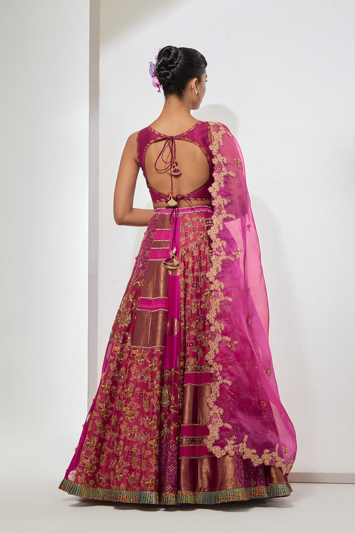 Fuchsia &amp; Rust Orange Multi-Panel Patchwork Lehenga Set with Heavy Pom-Pom Corset Blouse