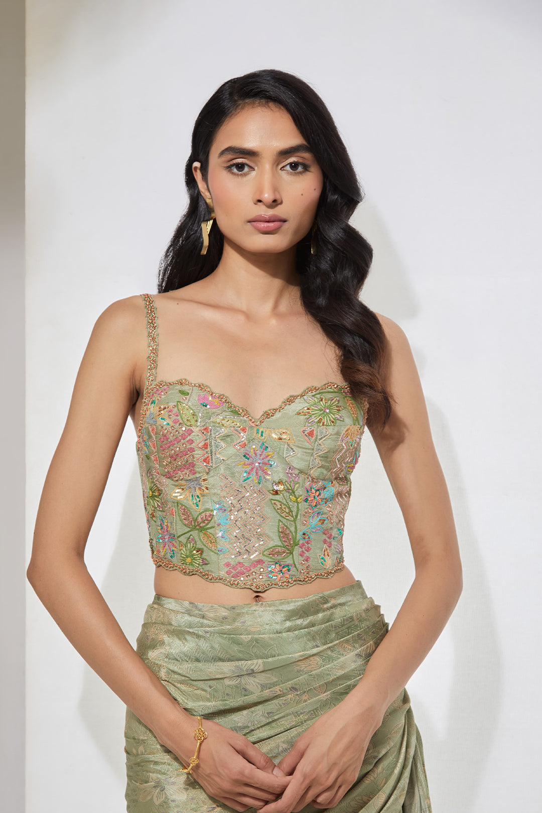 Sage Green Embellished Pre-Draped Saree with Corset Blouse