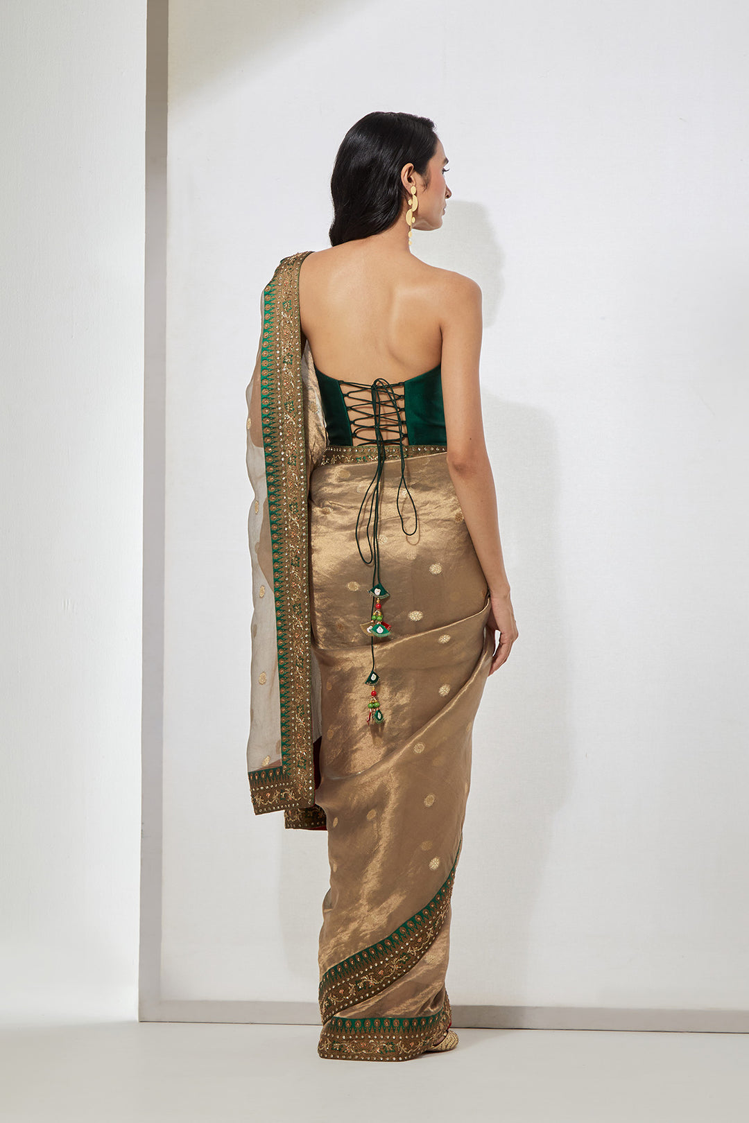 Antique Gold Tissue Saree with Emerald Green Border &amp; Heavy Corset Blouse