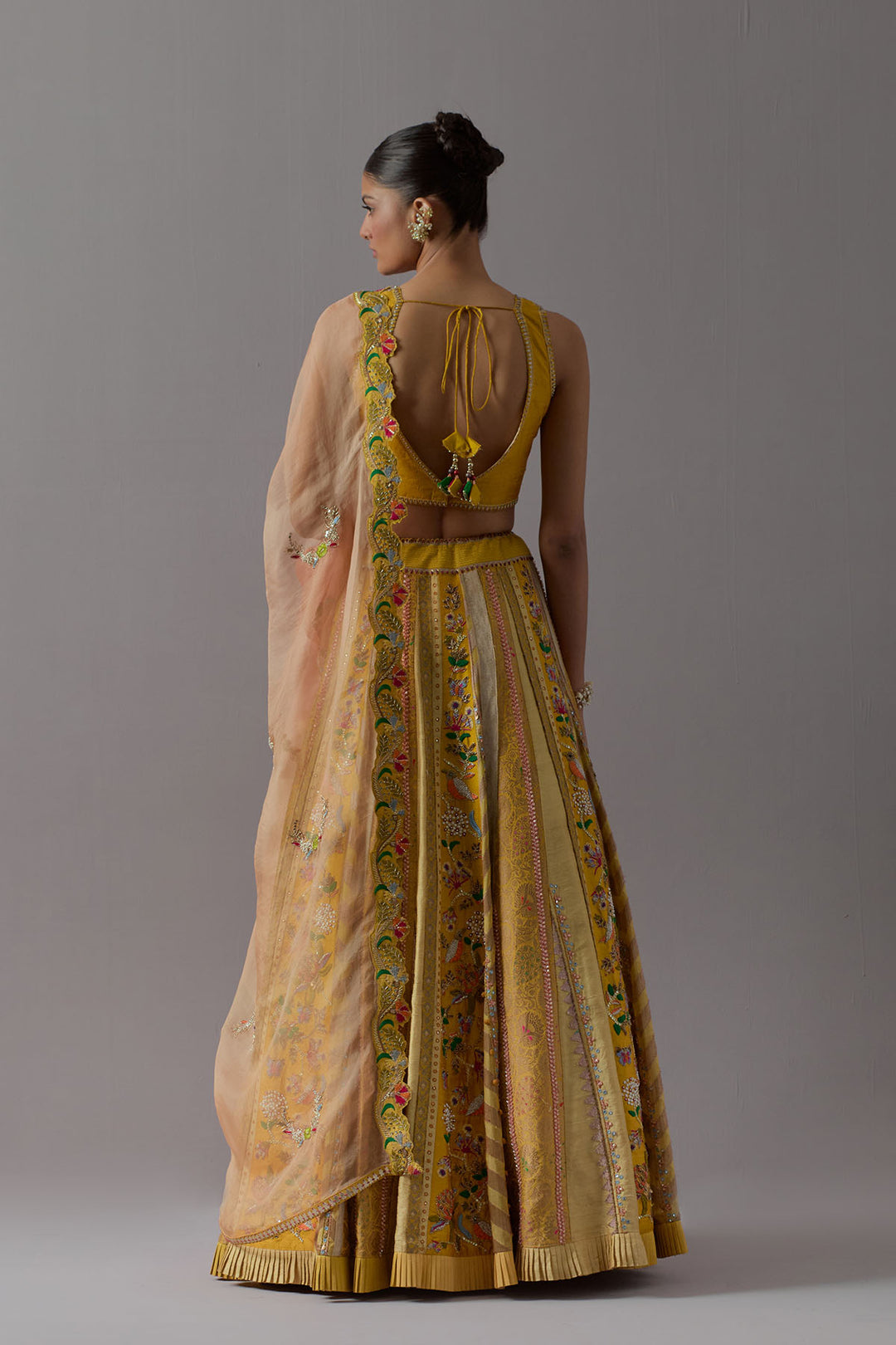 Mustard yellow embroidered lehenga choli with dupatta