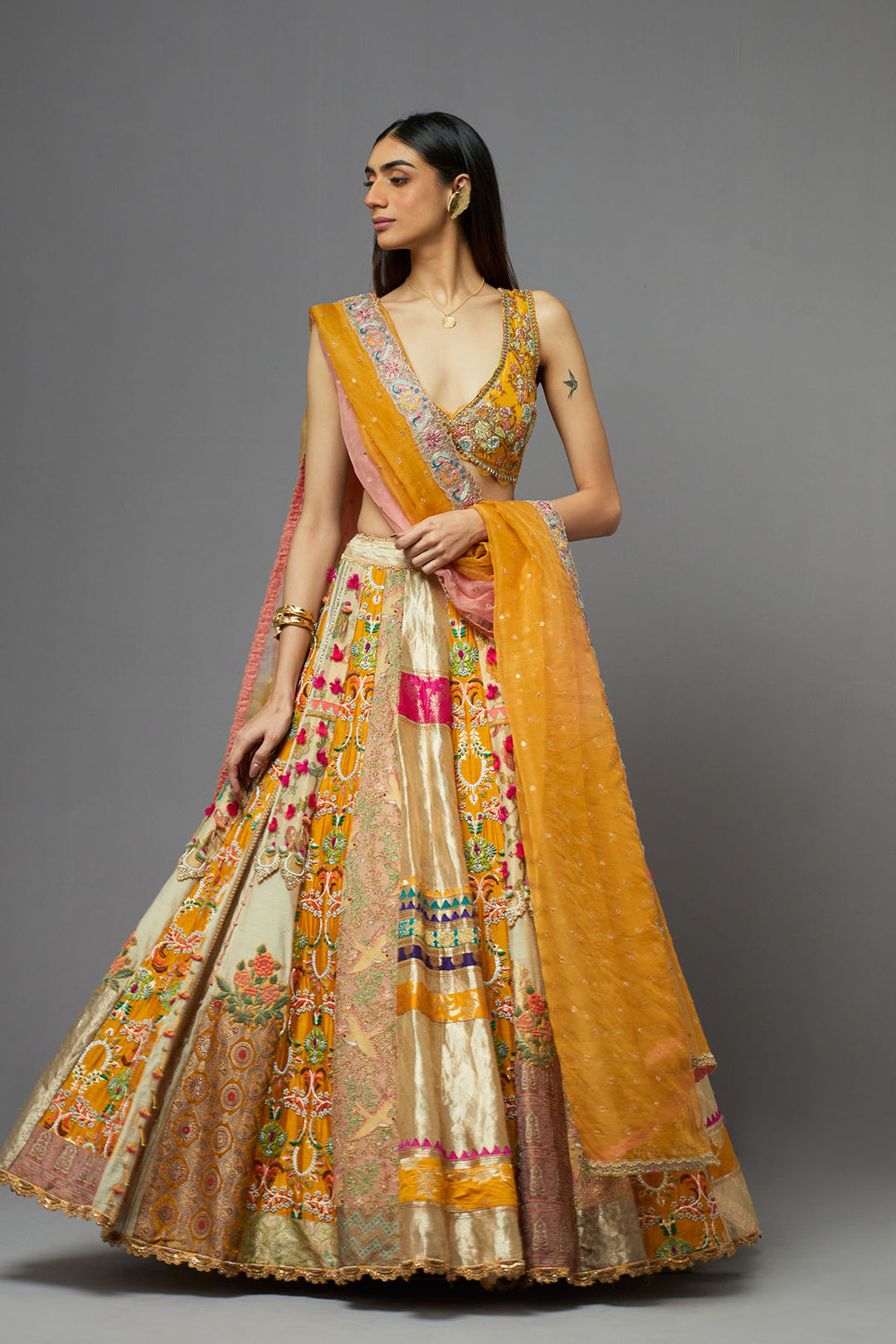 Mustard yellow embroidered lehenga choli with dupatta