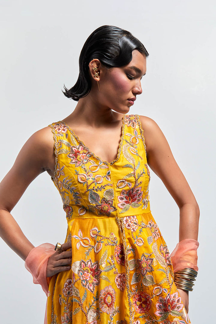 Mustard yellow embroidered peplum sharara set