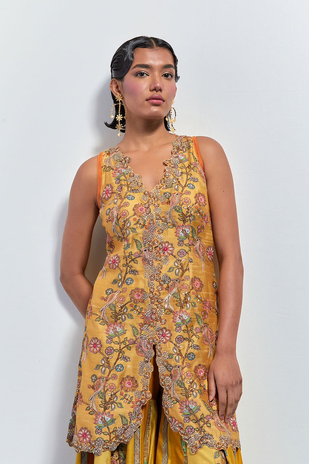Mustard yellow embroidered peplum sharara set