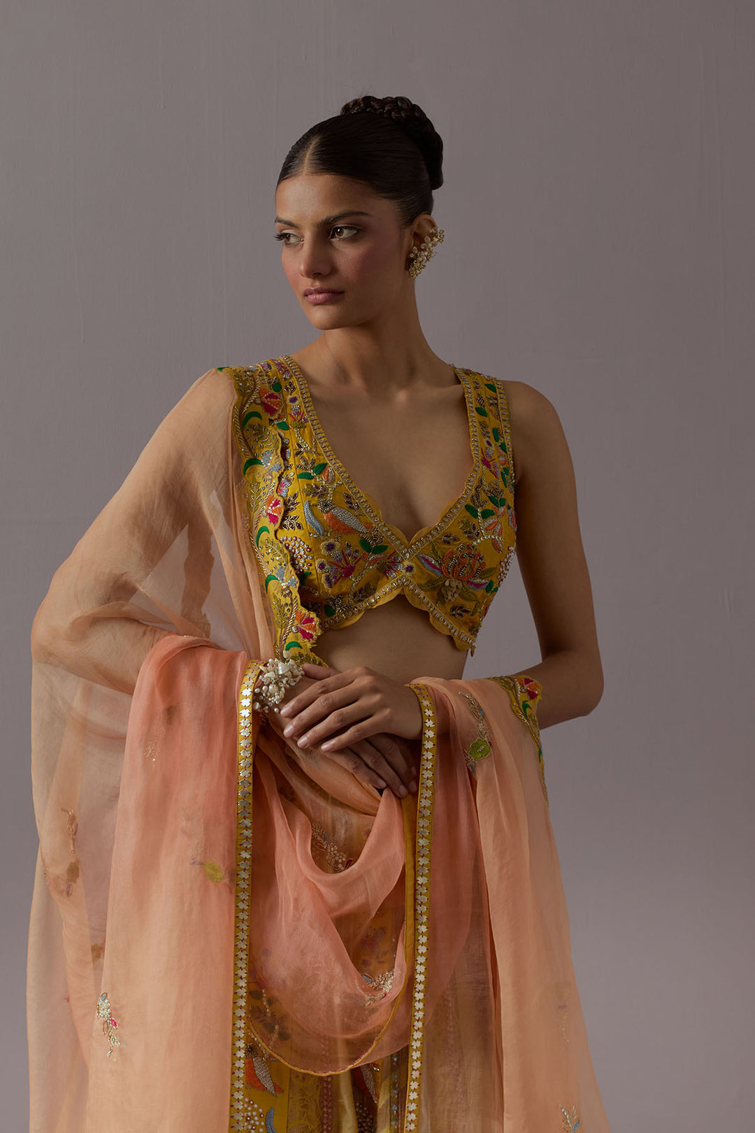 Mustard yellow embroidered lehenga choli with dupatta