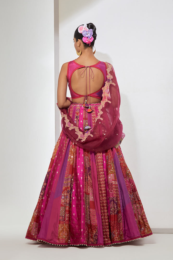 Fuchsia Pink Patchwork Banarasi Silk Lehenga Set with Heavy Multicolor Embroidered Blouse