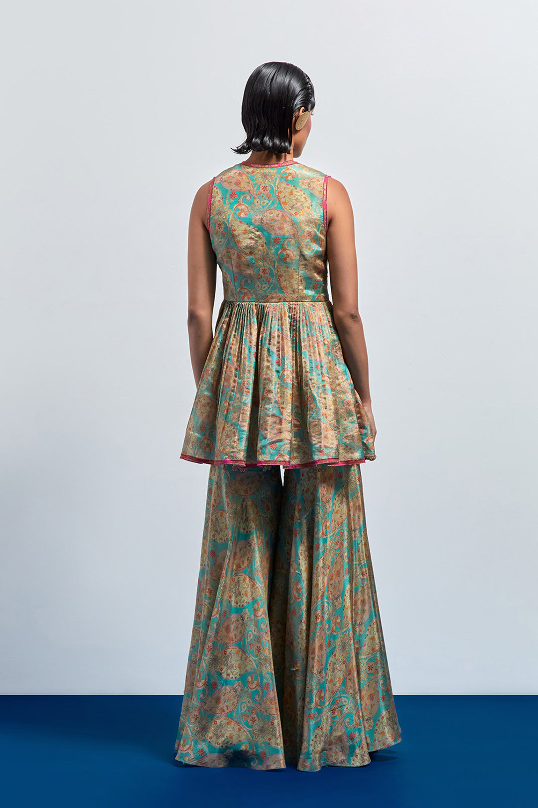 Saga green embroidered peplum sharara set