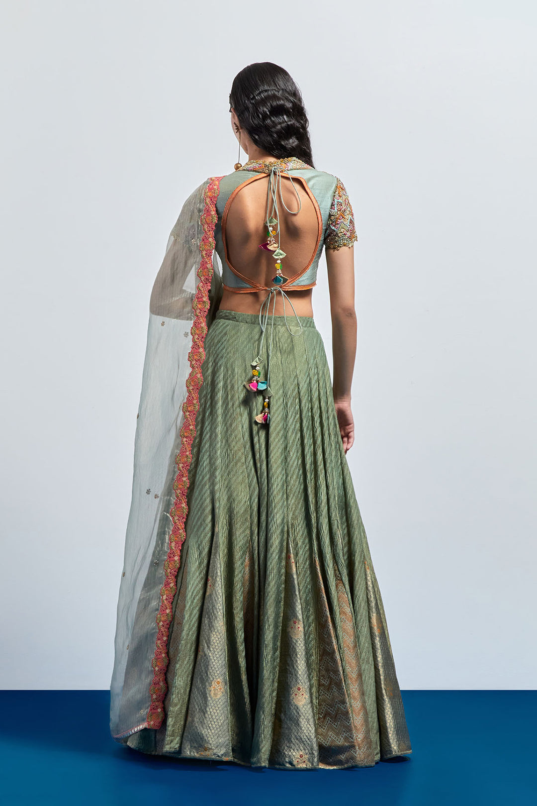 saga green embroidered lehenga choli dupatta set