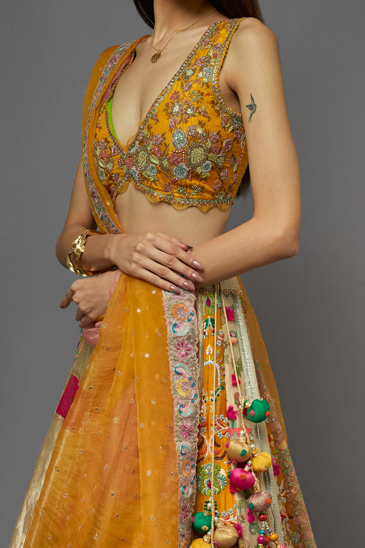 Mustard yellow embroidered lehenga choli with dupatta