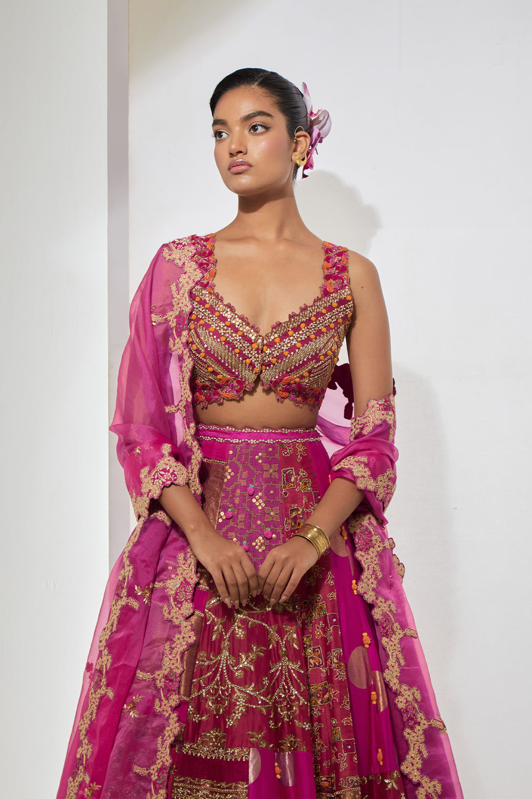 Fuchsia &amp; Rust Orange Multi-Panel Patchwork Lehenga Set with Heavy Pom-Pom Corset Blouse
