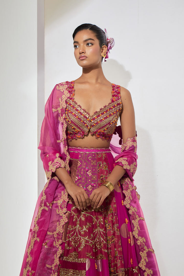 Fuchsia &amp; Rust Orange Multi-Panel Patchwork Lehenga Set with Heavy Pom-Pom Corset Blouse