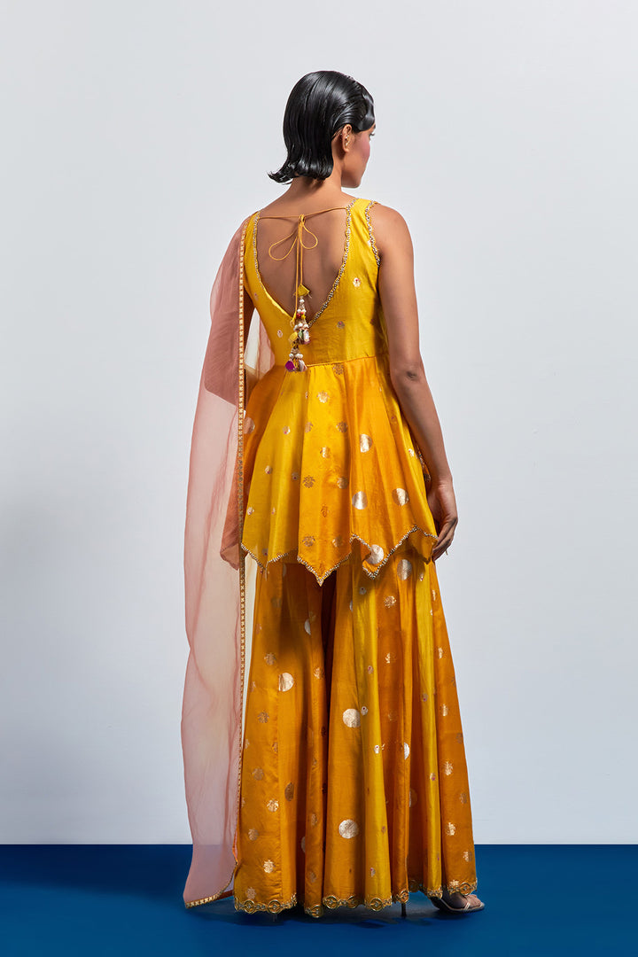 Mustard yellow embroidered peplum sharara set