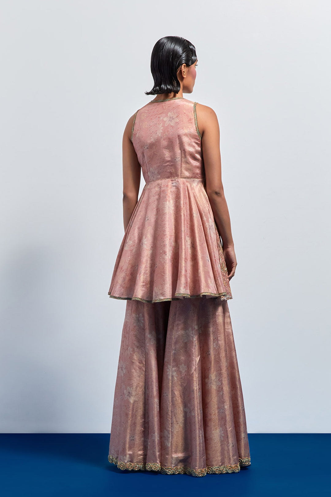Pink embroidered peplum sharara set