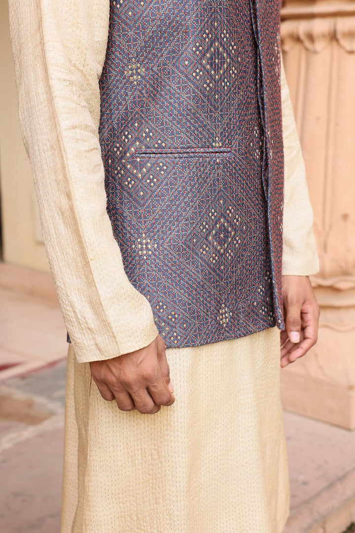 Beige kurta set with embroidered nehru jacket