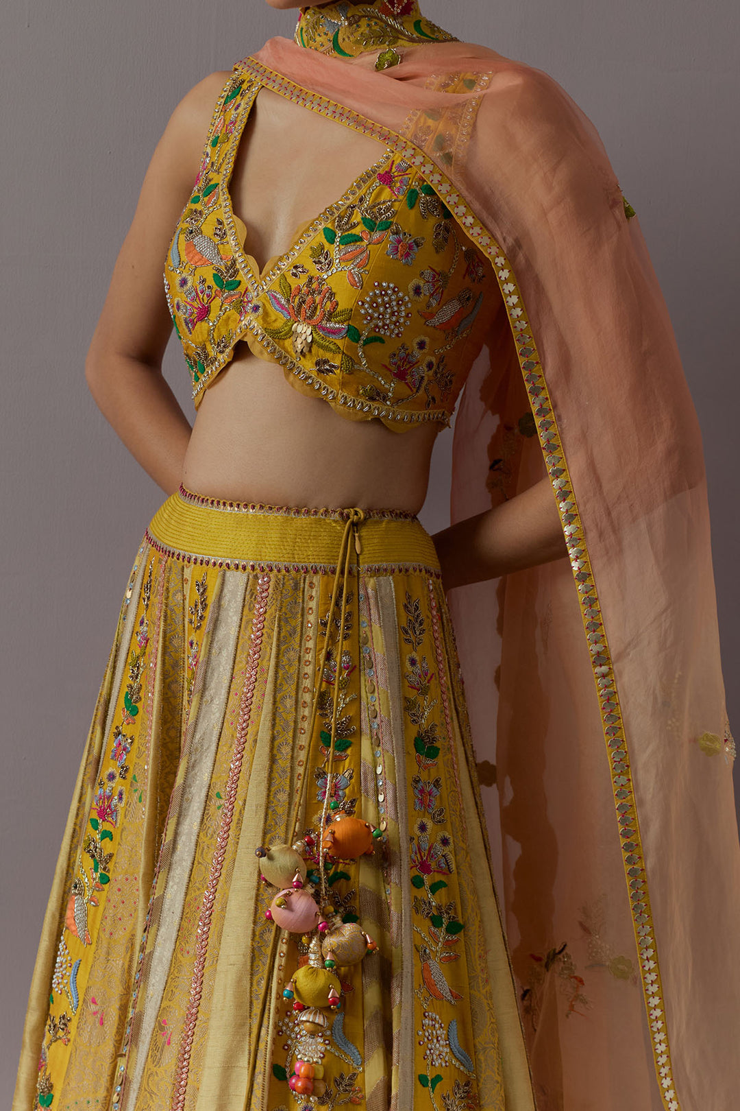 Mustard yellow embroidered lehenga choli with dupatta
