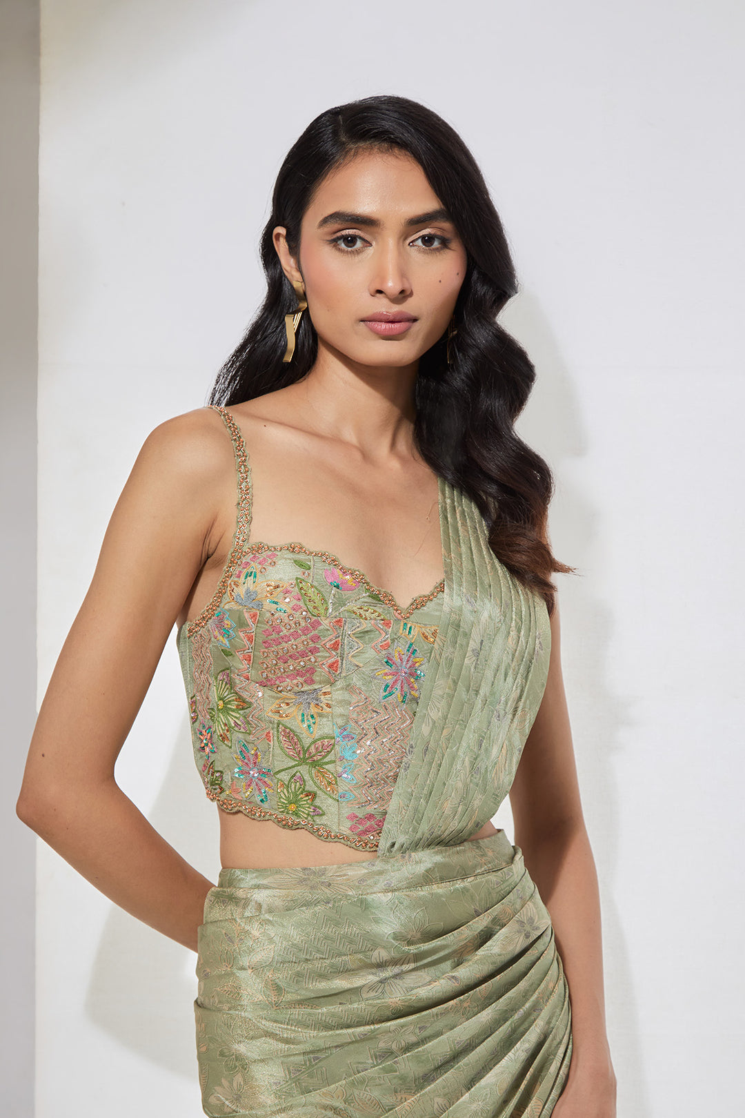Sage Green Embellished Pre-Draped Saree with Corset Blouse