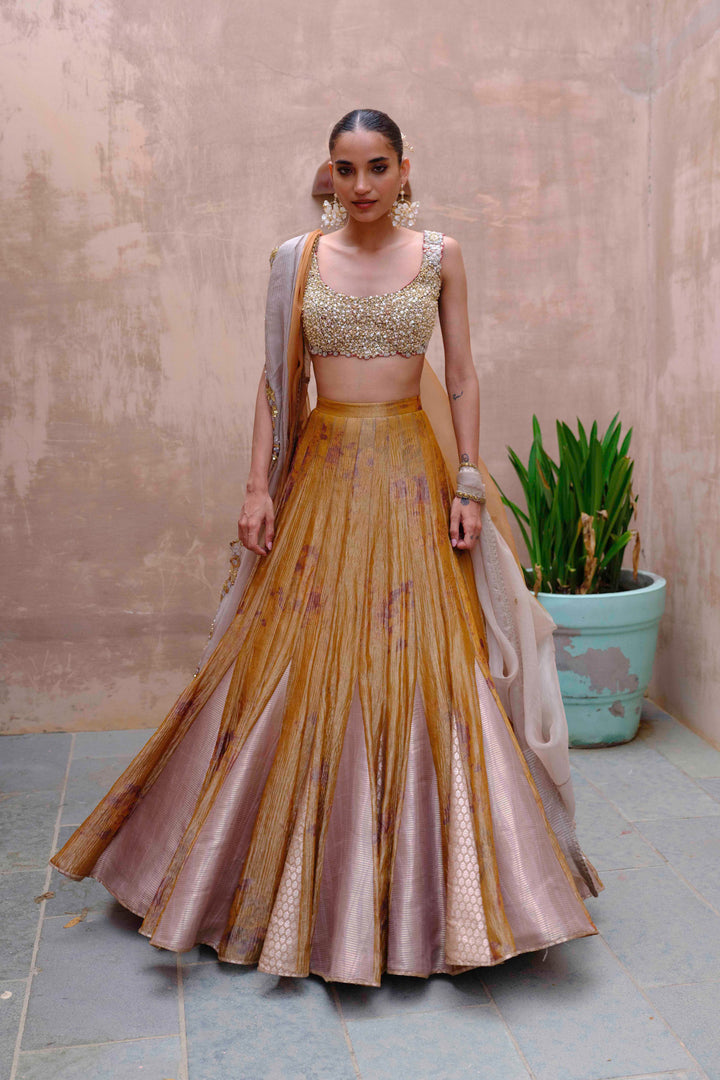 Antique Gold Tissue Lehenga with Embroidered Silk Blouse
